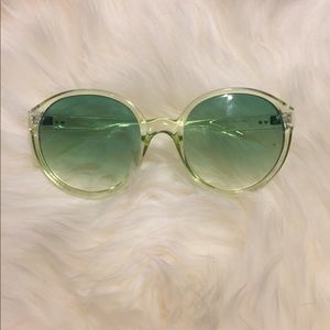 Green tinted lense fashion glasses